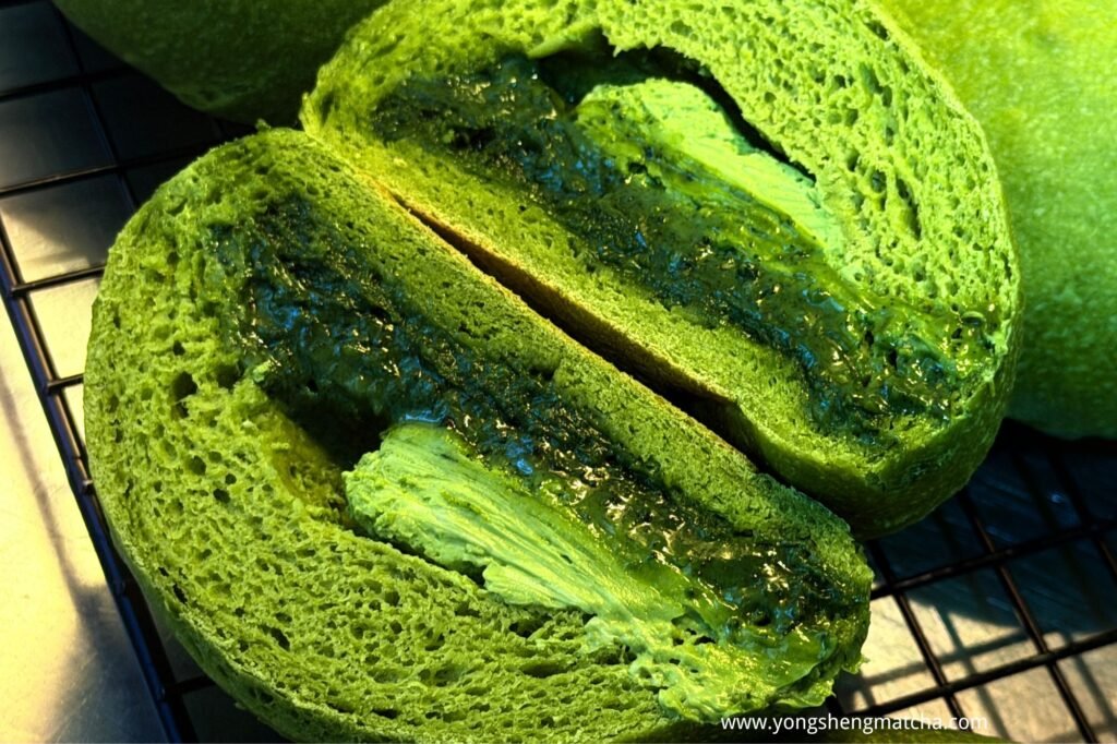 Cut green matcha puffs filled with cream and dark green tea jam